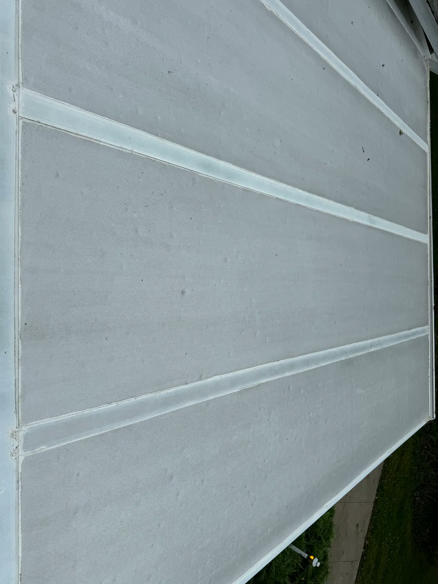 Same white vinyl siding clean after power washing