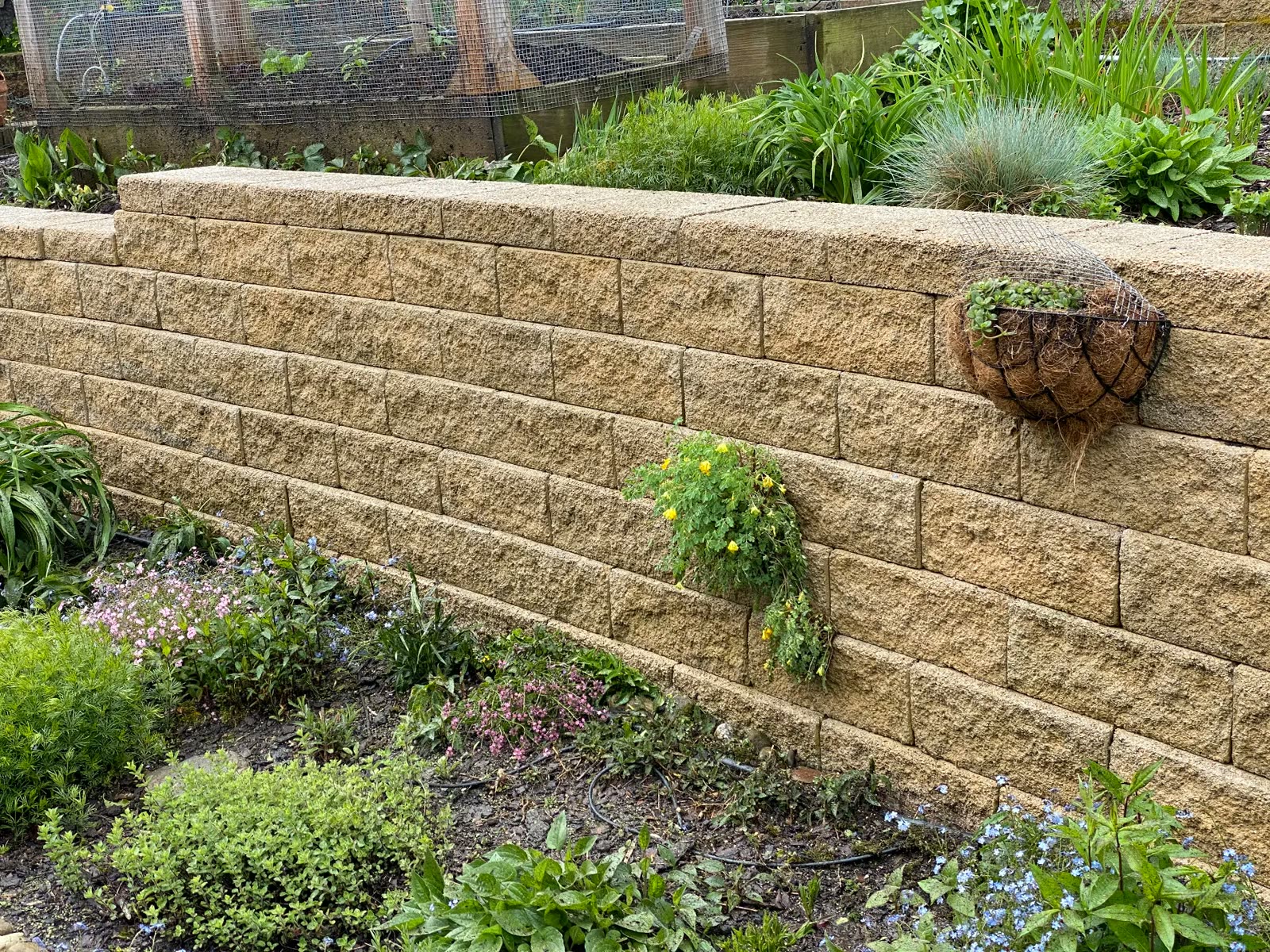 Stone retaining wall clean after washing